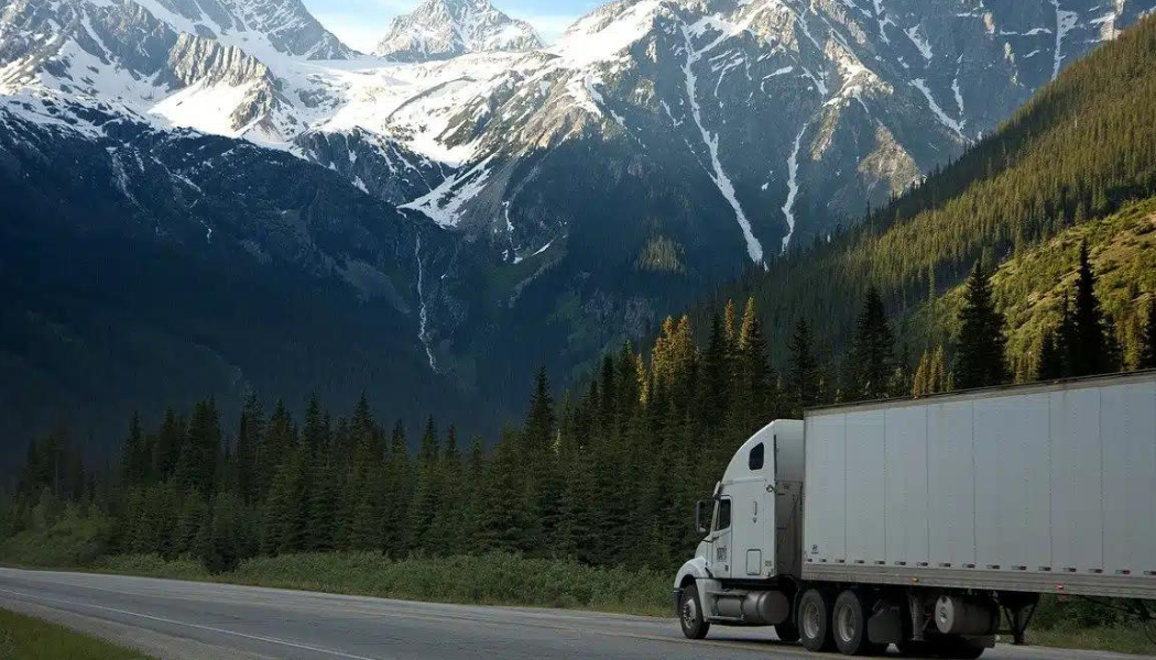 Colorado mountains landscape with a delivery truck